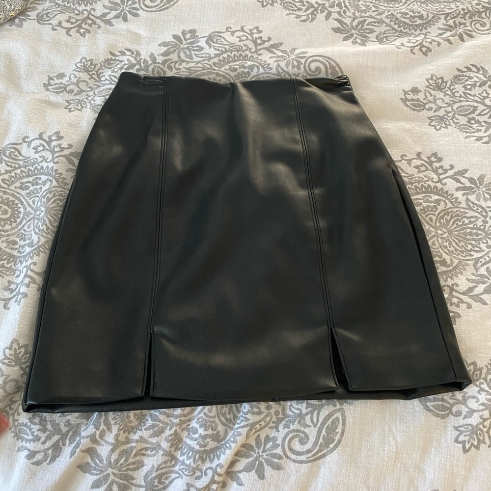 Black leather mini skirt